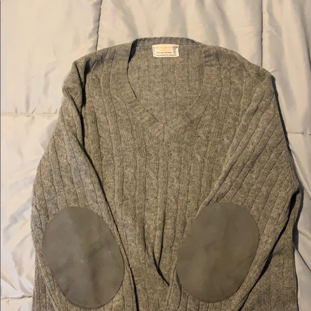 A hand knitted 100% cashmere sweater